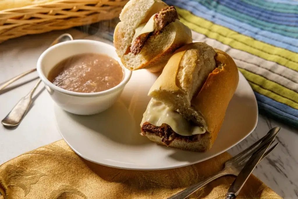 Philly Cheesesteak on a picnic table.