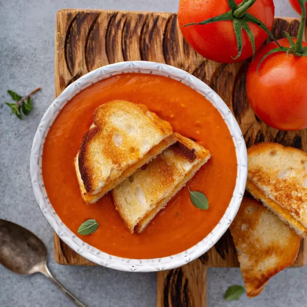 Grilled cheese sandwich and tomato soup.